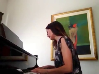 What song is Sharon playing?